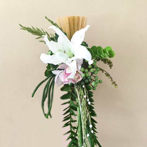 White casa blanca, and light pink cymbidium with berries
