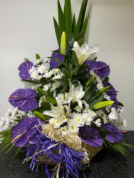 PUR5PLE ANTHURIUM WITH WHITE CASA BLANCA IN A BASKET
