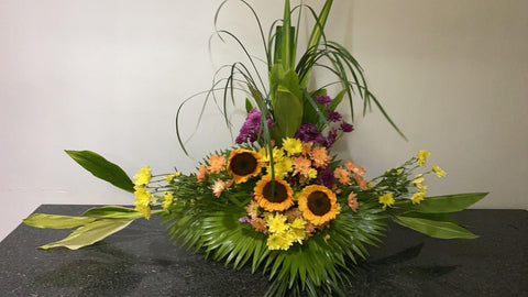 SPRING ARRANGEMENT IN A BASKET