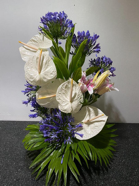 WHITE  ANTHURIUMS WITH STARGAZERAND AGAPHANTUS