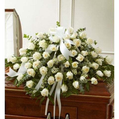 White roses in a casket