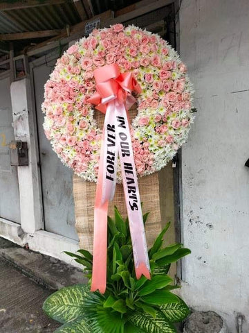 White Rados with Baby pink roses  Funeral standing